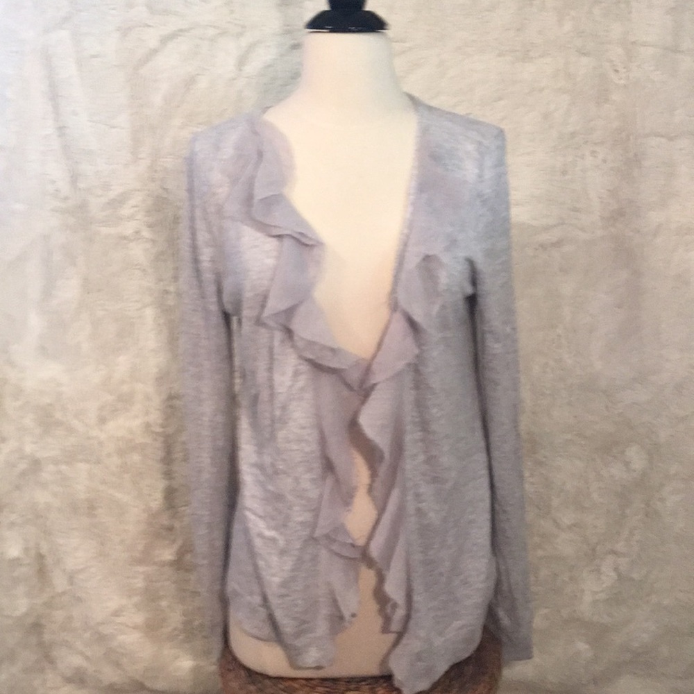Open in the front goes over another shirt